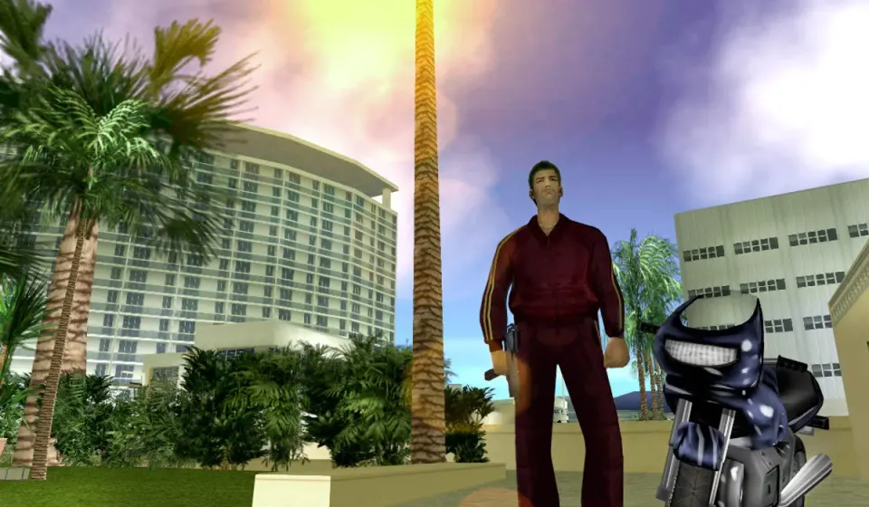 GTA Vice City scene with palm trees, beachfront buildings and a motorcycle